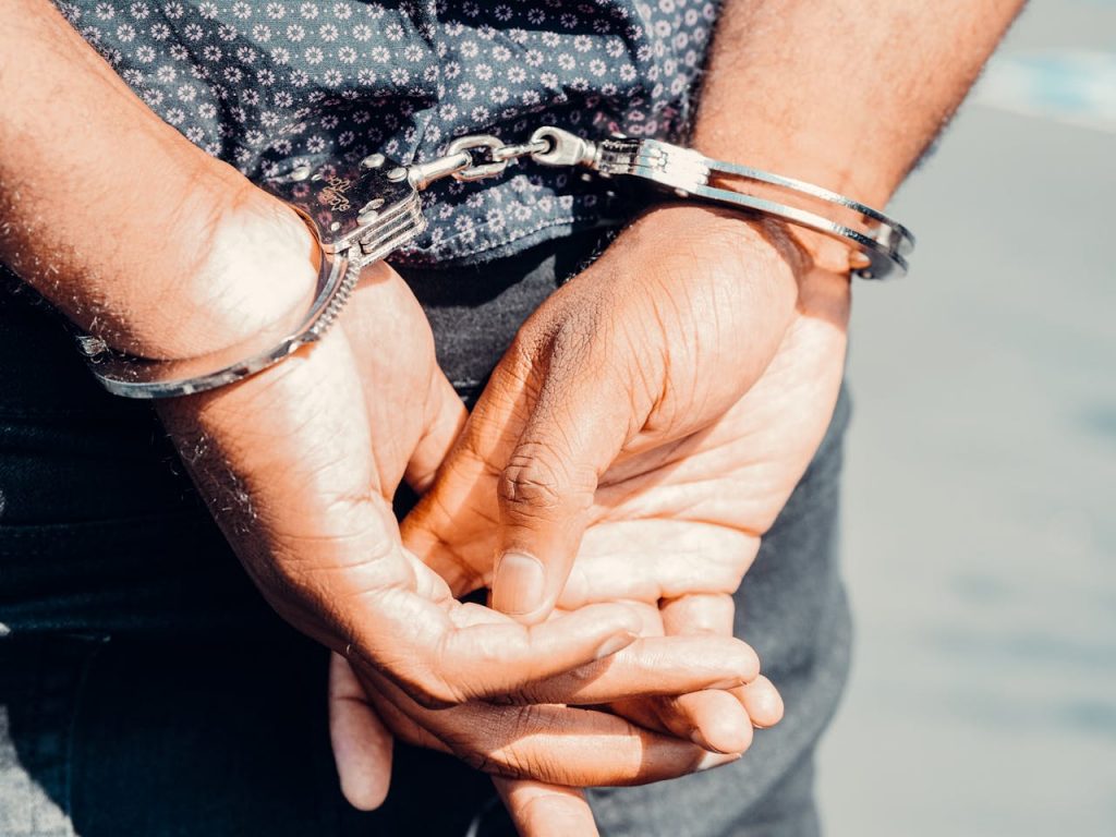 Los Angeles criminal defense lawyer explaining California’s felony-murder rule to a client.