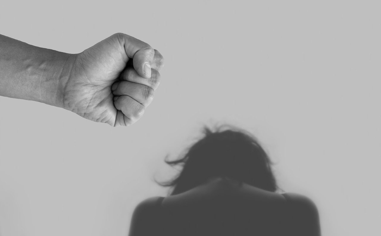 Concerned individual consulting with a Los Angeles corporal injury to spouse defense attorney