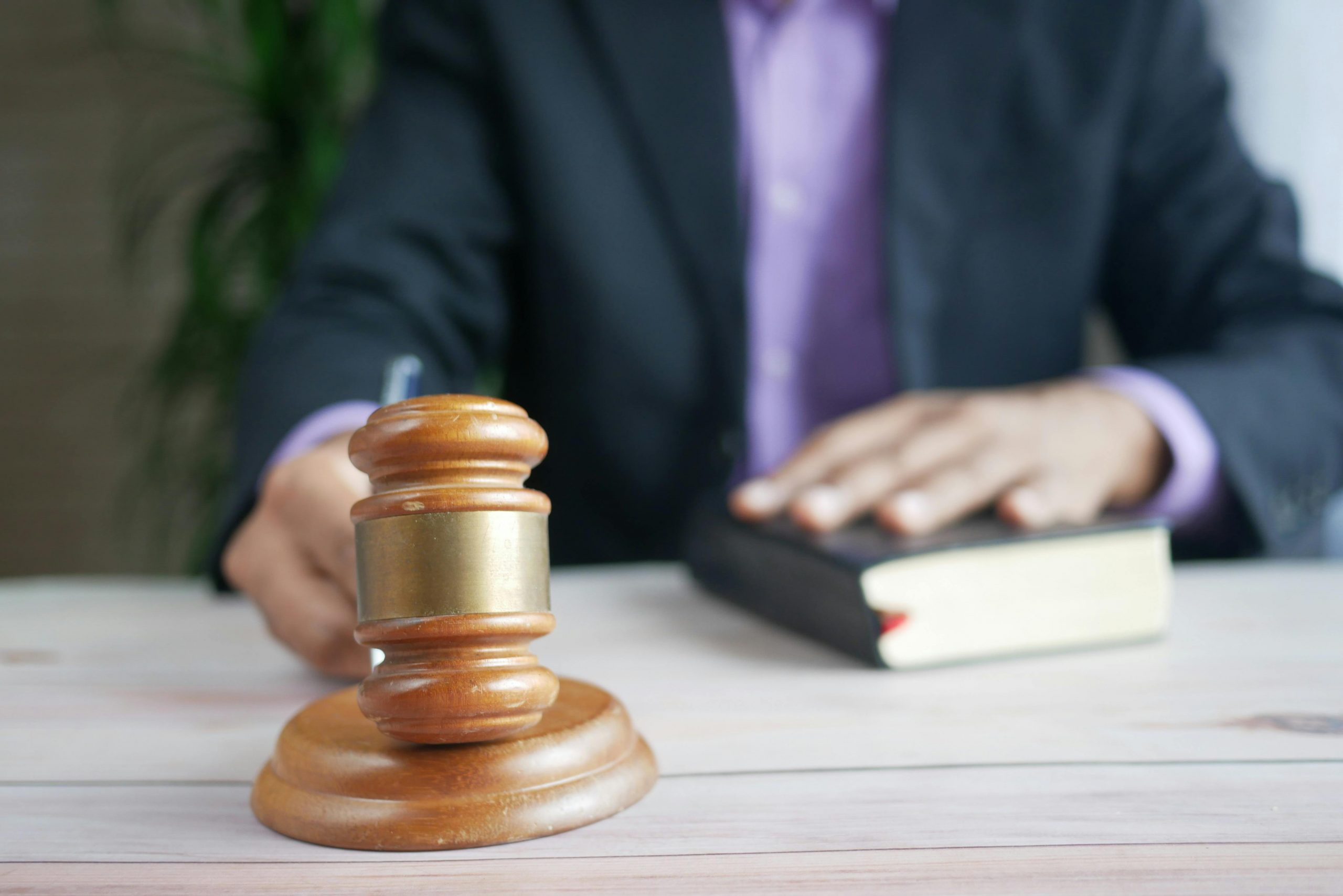 A Los Angeles criminal defense attorney discussing self-defense laws with a client facing charges.