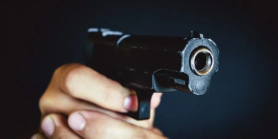 California Penal Code 26100 PC prohibits discharging a firearm from a motor vehicle or allowing someone else to do so