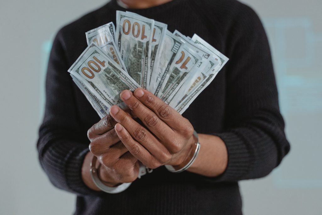 Signed contract and cash representing a theft by false pretenses case in California